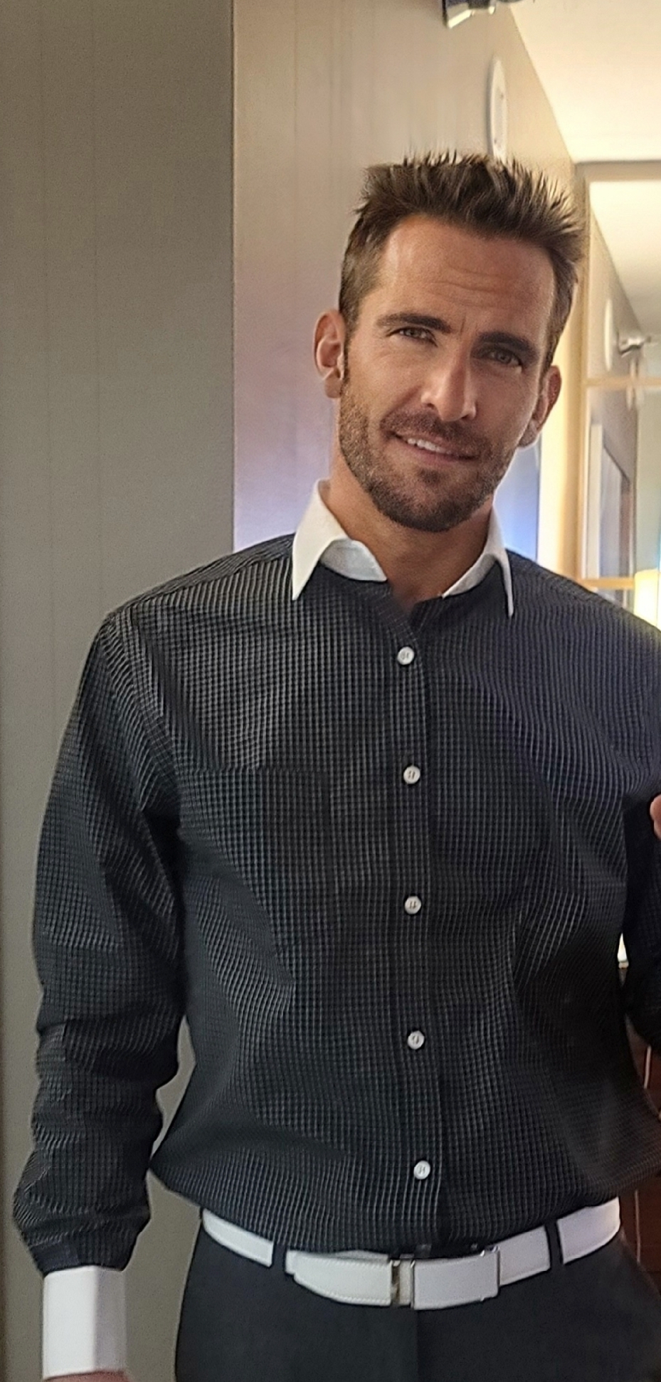 Robin C. Hoffpauir dressed in smart casual attire.