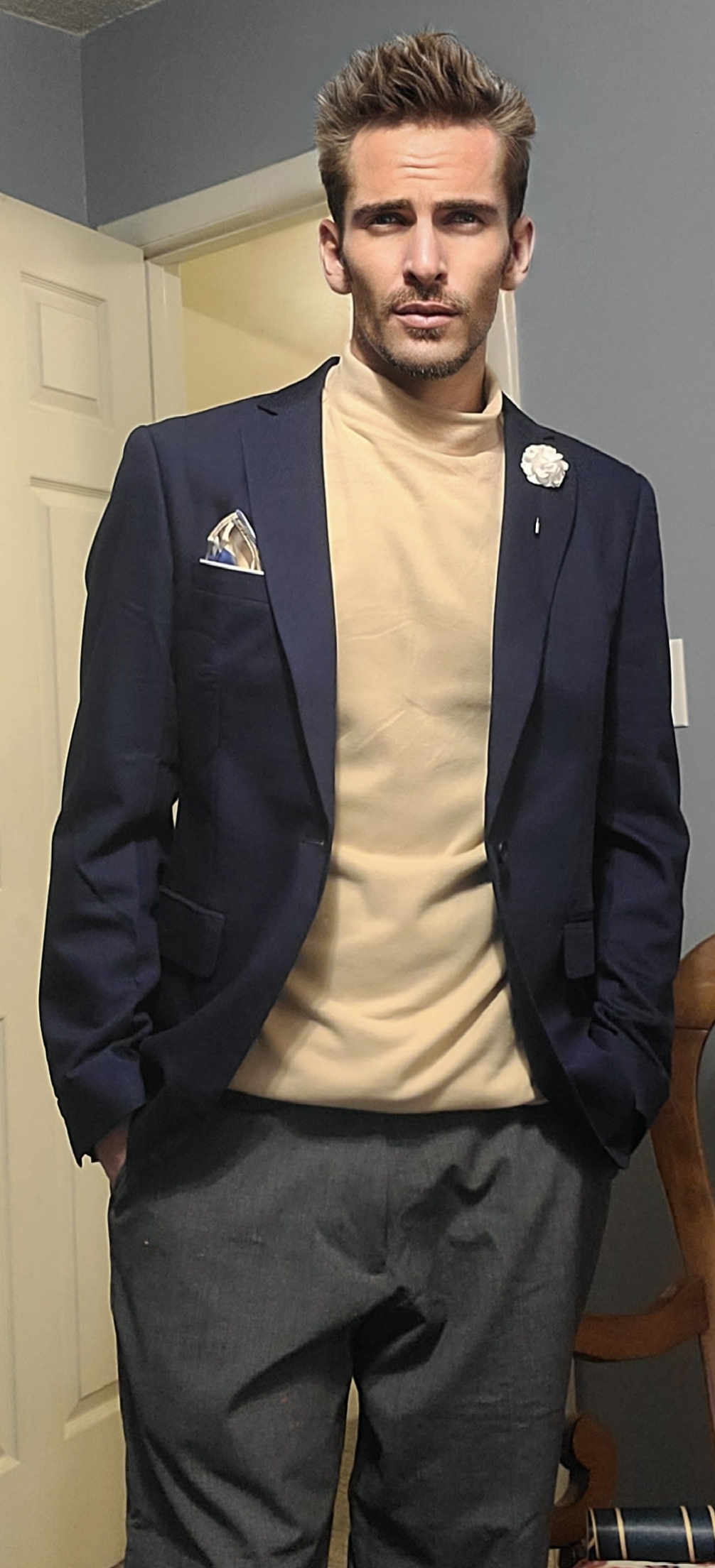 Robin C. Hoffpauir in a tailored jacket, standing confidently.